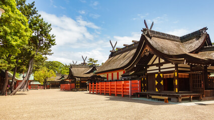 Sacred temples of different religions in the old precinct of the city of Osaka, Japan.