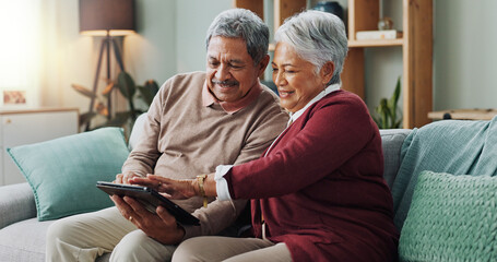 Senior couple, happy and tablet for memories, streaming and communication in living room. People,...