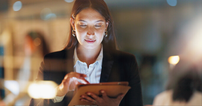 App, tablet and window with business woman in office for learning, reading or research. Internet, software and tech with professional employee in corporate glass workplace for email feedback