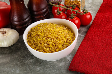 Dry wheat bulgur cereal heap