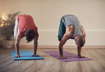 People, yoga or crane pose in house for health, wellness or body flexibility for practice routine...