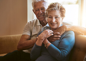 Portrait, home and old couple with hug, trust and relationship with happiness, bonding together and...