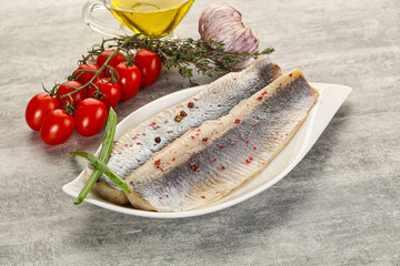 Marinated herring fillet with green onion