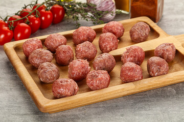 Uncooked raw beef meatball minced