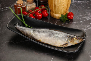 Whole raw salted herring fish