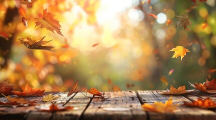 Wooden table with orange fall leaves, autumn natural background