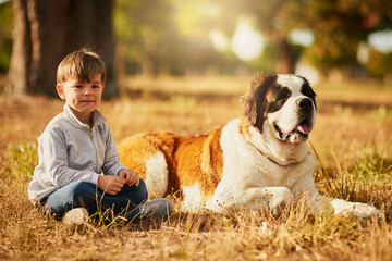 Relax, dog and portrait of child in outdoor park for affection, friendship or cuddle pet in nature....