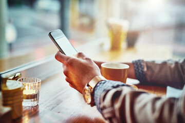 Hands, coffee and person with mobile phone in cafe for job search app, connection or networking....