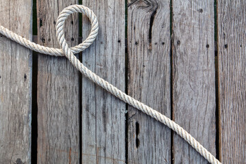 Rope on a wooden background