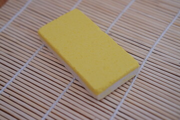 yellow snacks on a bamboo mat, close-up, selective focus