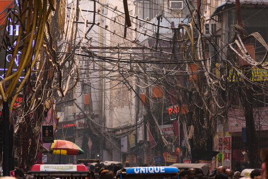 Maze of electrical wires at a street of Old Delhi, India.
