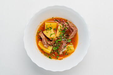soup with veal on white background