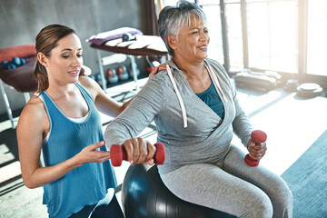 Old woman, physiotherapy and dumbbell exercise or arm rehabilitation for injury training, joint...
