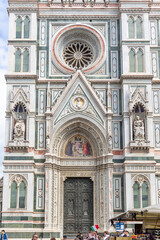 Florence, Italy - April 10, 2024: Florence cathedral with surrounding area full of tourists in...
