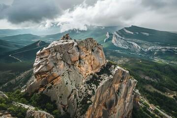 Naklejka premium a large rock formation in the middle of a mountain range