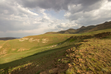 Clouds starting to gather in the late afternoon over the Afro alpine grasslands and high peaks of...