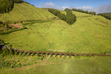 Scenic View of Historic Muro das 9 Janelas Aqueduct Covered in Moss, São Miguel Island, Azores