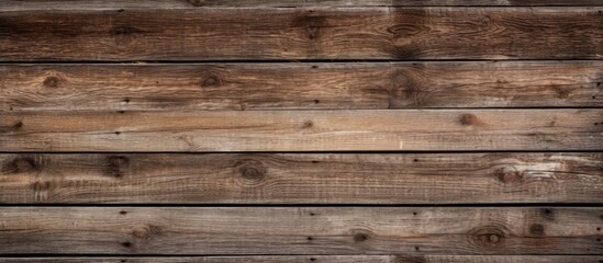 Fototapeta premium An image of a weathered wooden background providing a copy space for text or other elements