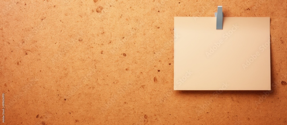 Poster An abstract paper note pinned to a cork board creating a mock up with ample copy space