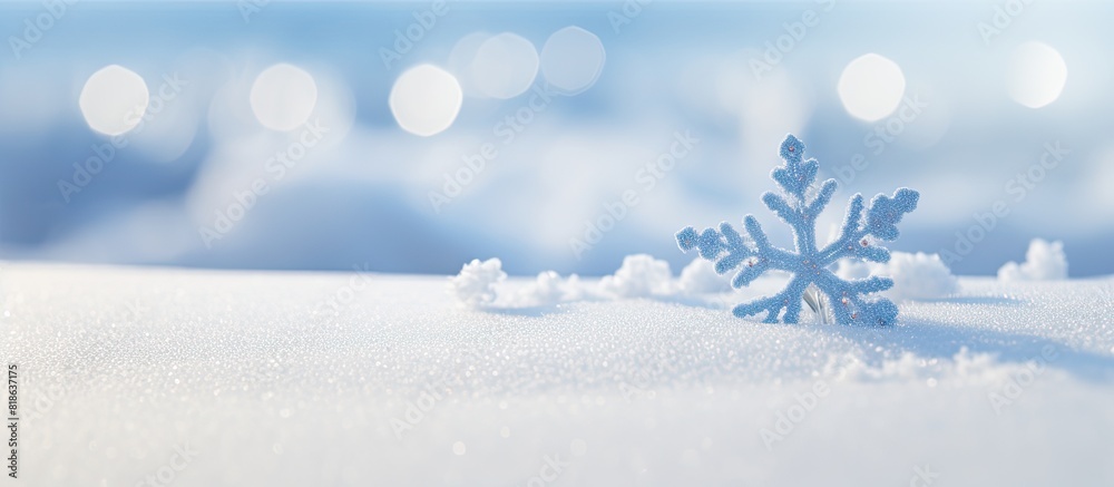 Poster close up of a colorful christmas decoration on snow with ample copy space image
