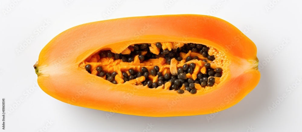 Poster top view of a perfectly ripe papaya slice isolated on a white background providing ample copy space 