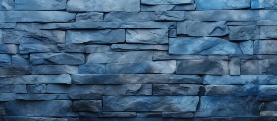 Top view texture of a wall either made of blue stone or concrete providing a background with ample copy space for images
