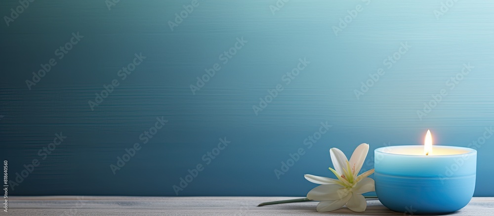 Poster spa a serene setting with a flickering candle and a small blue ceramic perfect for relaxation and tr