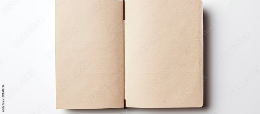 Poster A high angle view of an empty notebook with a recycled paper cover placed on a white background providing ample space for other images