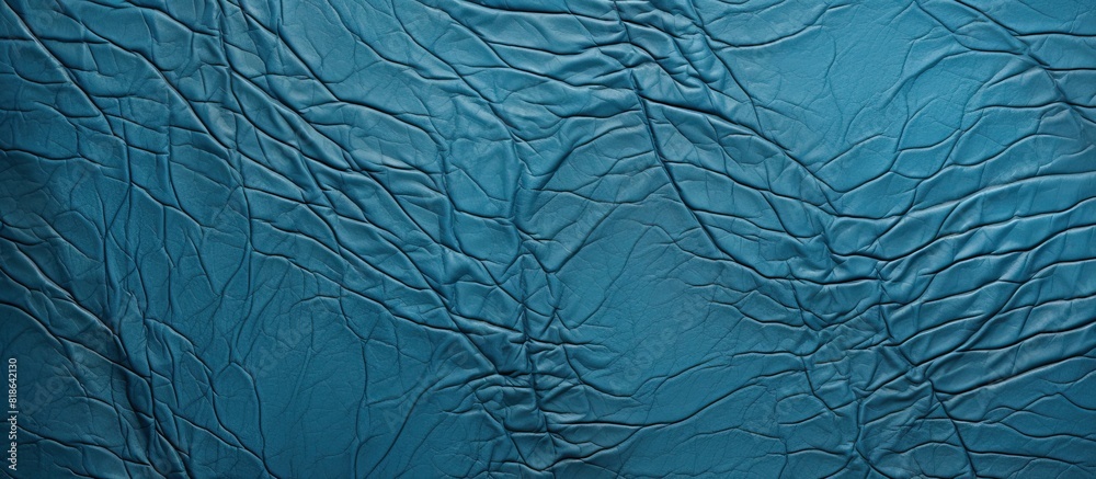 Poster a background image with a wrinkled pattern and a blue leather texture showcasing a natural material 