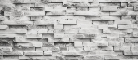 The copy space image showcases a textured grey and white brick wall background