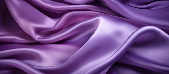 Obraz premium Closeup of a violet fabric with a textured background providing ample copy space for images