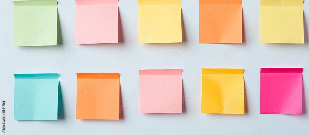 Poster Colorful paper notes set on a blank background offering ample copy space for text
