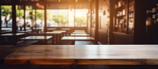 Naklejka premium The menu frame is positioned on a wooden table in a bar restaurant cafe creating a copy space image for text placement