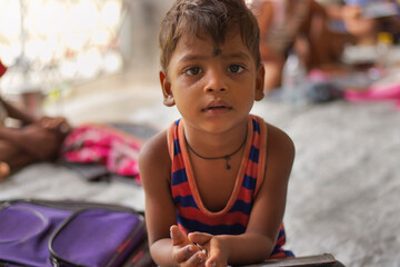 Close up Anganwadi School boy  studying at school, looking at camera in west bengal