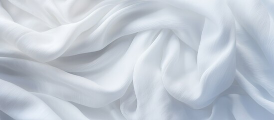 Obraz premium Closeup of a white fabric with a soft wool texture creating a natural and textured backdrop for a copy space image