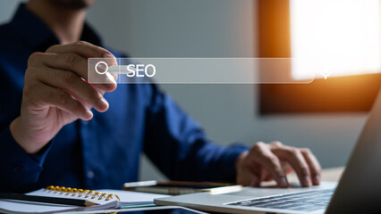 SEO, Search Engine Optimization Man taps search bar on virtual screen to search for information...