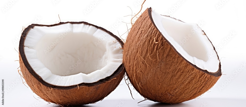 Poster An isolated copy space image of a halved coconut on a white background