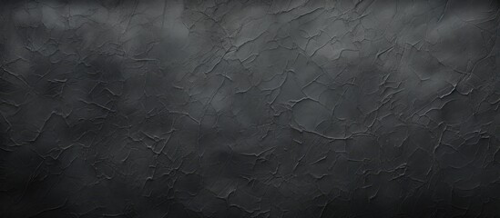 Background with black paper texture providing a copy space image