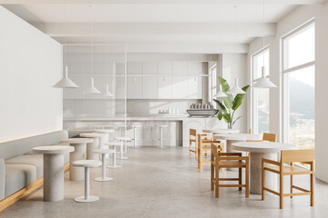 Modern minimalistic cafe interior with wooden chairs, white tables, and pendant lights, in natural light. Concept of contemporary design. 3D Rendering