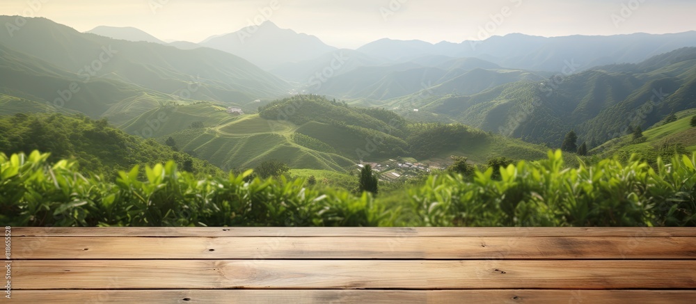 Aufkleber Copy space image of an empty wooden table overlooking a picturesque mountain or a wooden desk surrounded by a serene tea plantation with a blurred bokeh background Add your own text