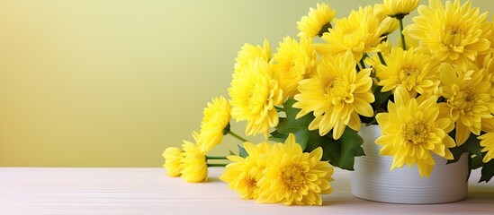 Flower arrangement featuring a bright yellow chrysanthemum with ample copy space for images
