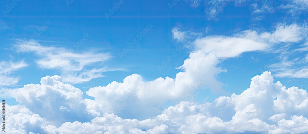 Poster the expansive blue sky with fluffy clouds as a copy space image