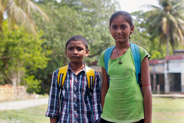Obraz premium Indian Rural Children with backpack going to school