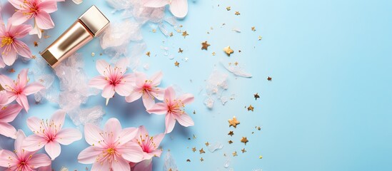 A Cosmetics Branding Concept with spring pink flowers gold star confetti and cosmetic mock up gold...