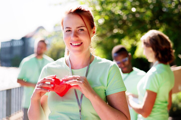 Volunteer Holding Heart Symbol Shape