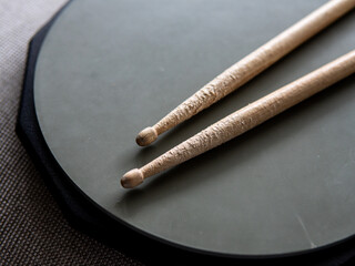 Percussion Instruments Music School, training pad and drumsticks. learning music, music education