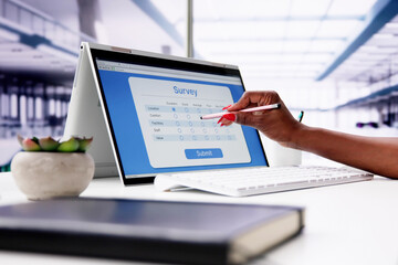 African Woman Filling Survey Poll Or Form