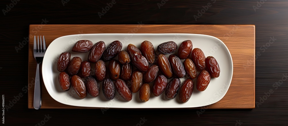 Leinwandbilder a copy space image of dates arranged on a white dish placed on a dark wooden table can be seen from 