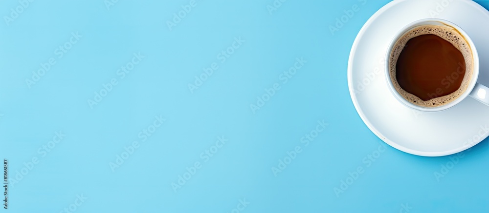 Poster blue background with a flat lay of an empty white coffee cup providing ample space for text
