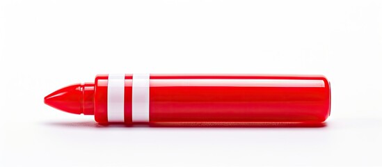 A red marker pen with a removable cap and stripes on the handle shown on a white background in a copy space image